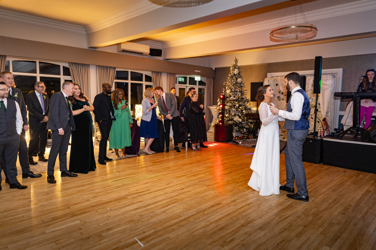 Bride and grooms first dance at the Heights Hotel Killarney, decorated for Christmas.