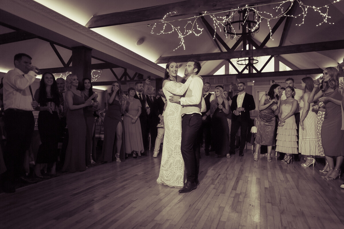 Black and white photograph of bride and grooms first dance at the Ballyseede castle hotel in Tralee.