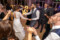 Bride and groom dancing amongst guests at their wedding reception in the Heights Hotel Killarney.