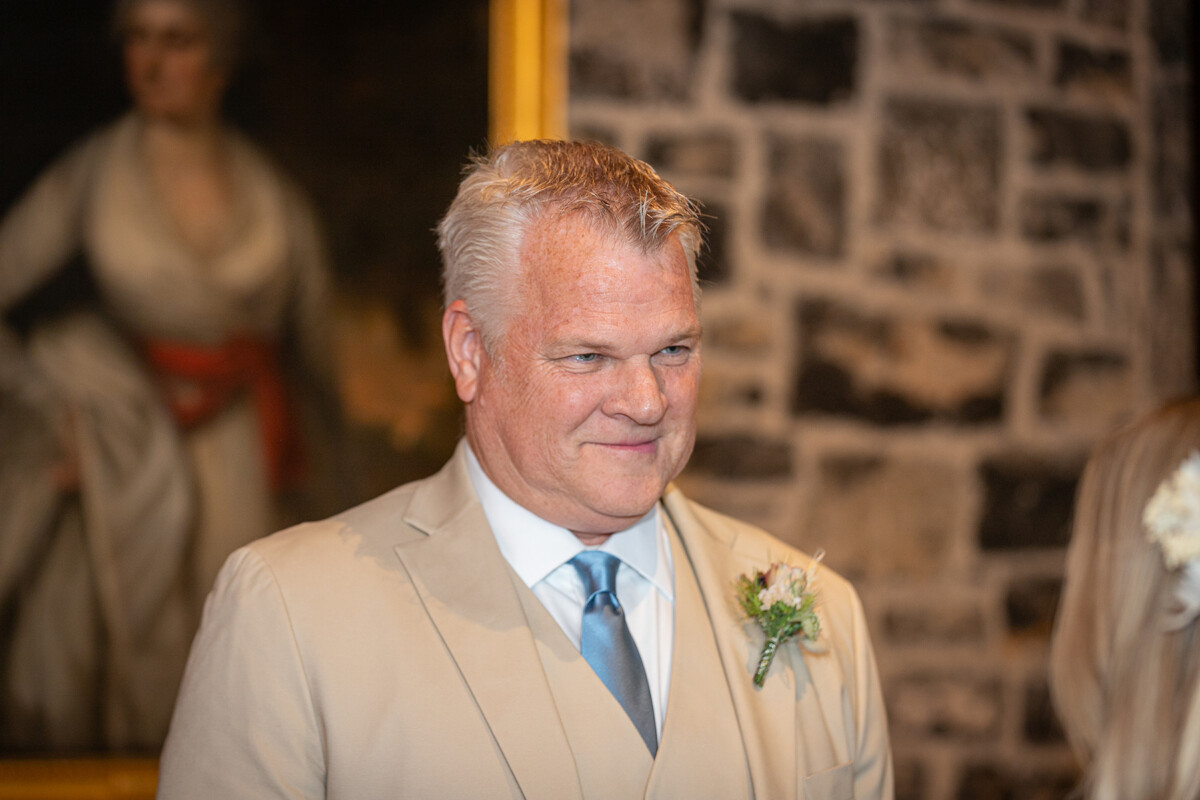 Close up of husband during vow renewal ceremony at Ballyseede castle, Tralee.