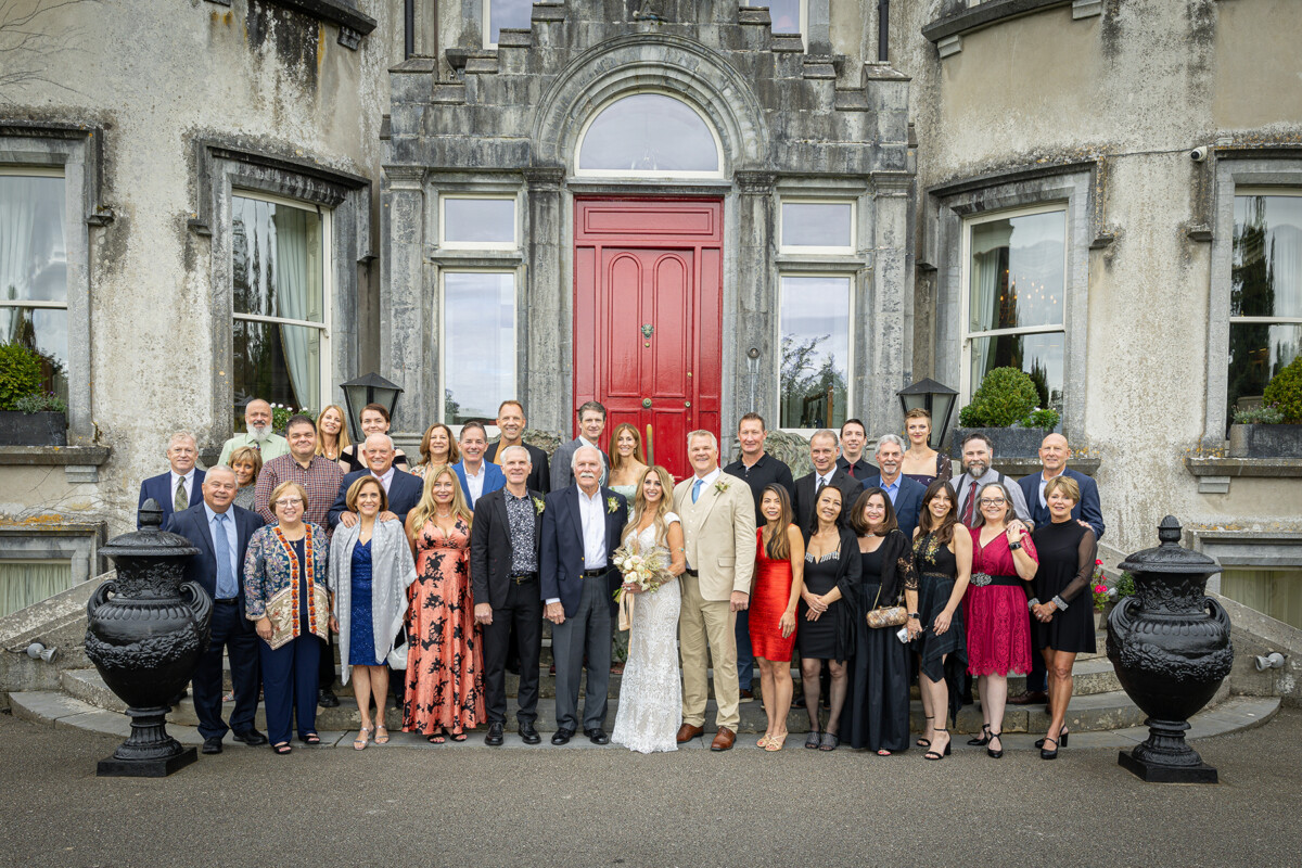 Large group picture of family at a wedding vow renewal at Ballyseede castle hotel, Tralee.