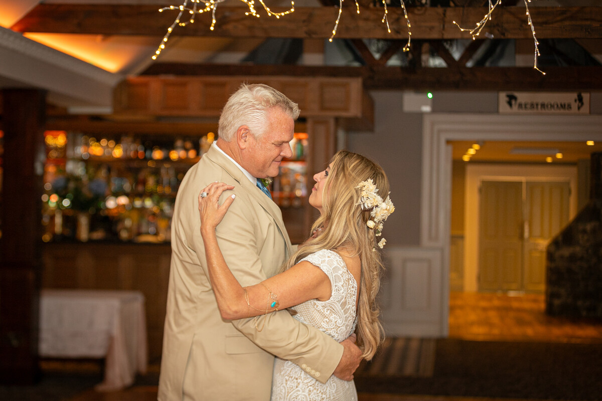 Close up of husband and wife dancing at the afterparty of their vow renewal at Ballyseede castle.